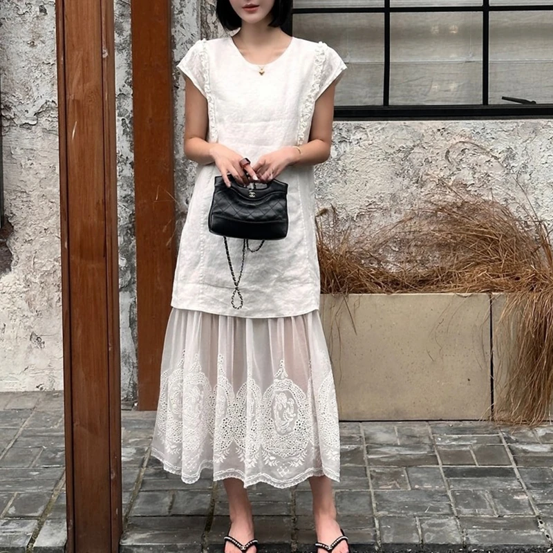 法式慵懒风重工短袖连衣裙女2026夏季新款气质蕾丝拼接中长款裙子