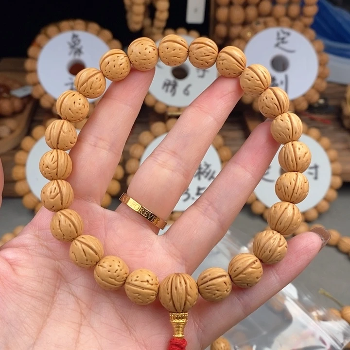 桃核手串利金蝉子11.5A抛光板误差0.5