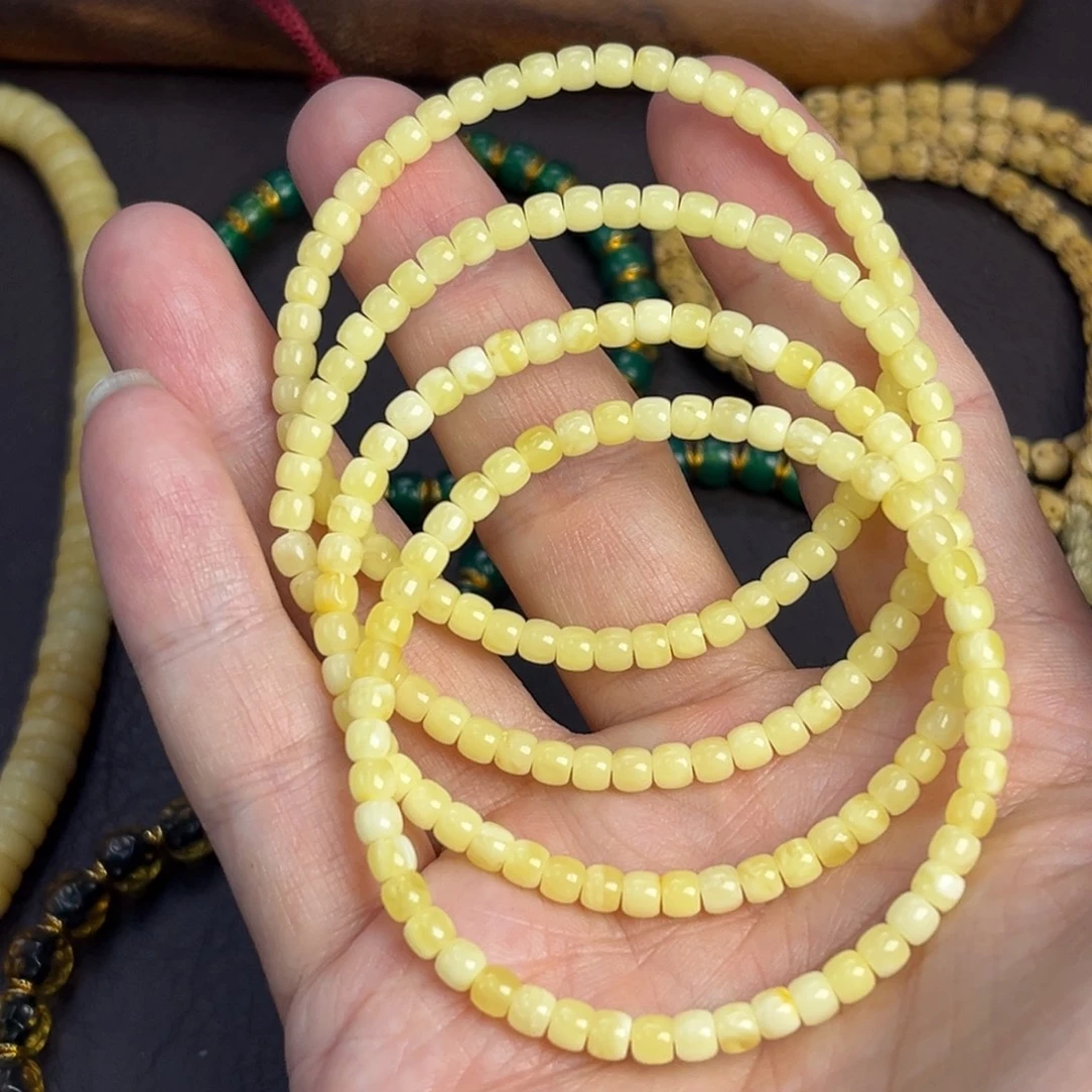 琥珀未镶嵌裸石4mm奶黄包多样发其一