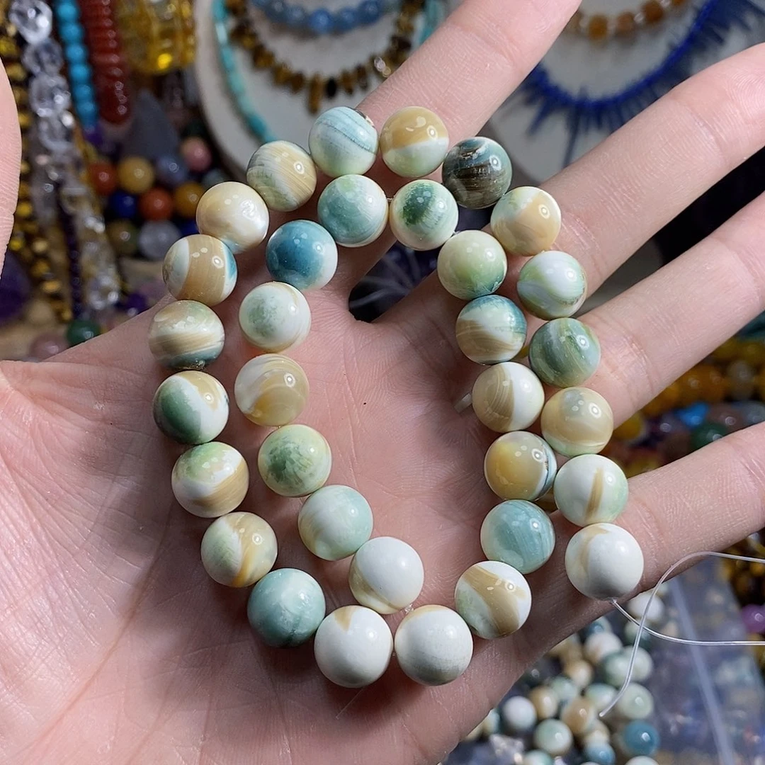 石英质玉未镶嵌，天然蓝翡色夜光螺12mm，