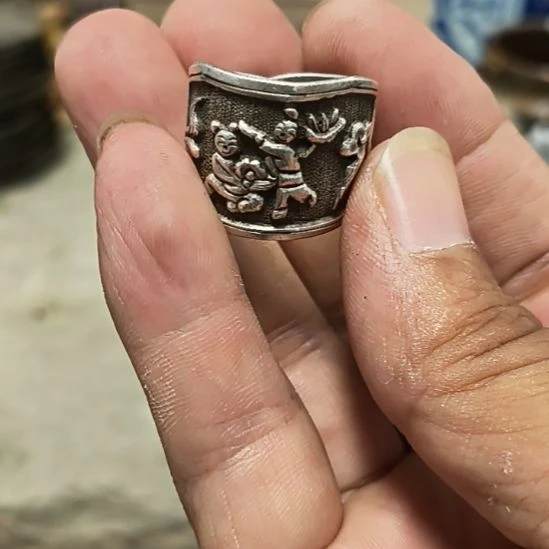 往***风玻璃颈饰一个童子送财银戒指
