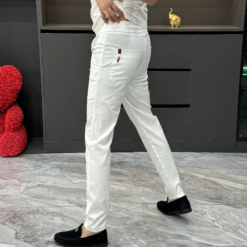2025夏季薄款时尚简约透气长裤男士韩版亚麻休闲裤纯色宽松小脚裤