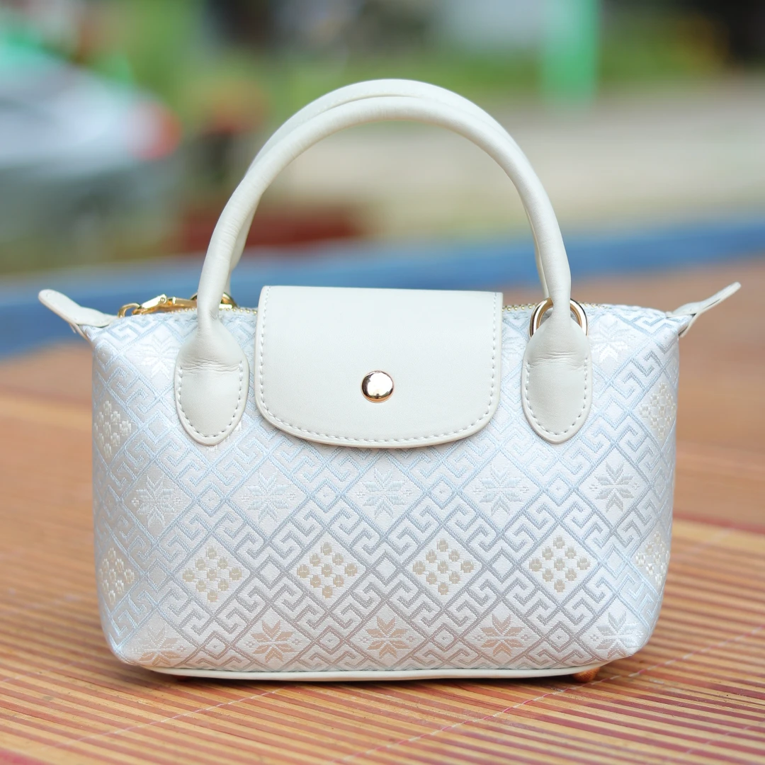 广西非遗壮锦包包小饺子包民族风女士手提斜挎包高级轻奢百搭时尚