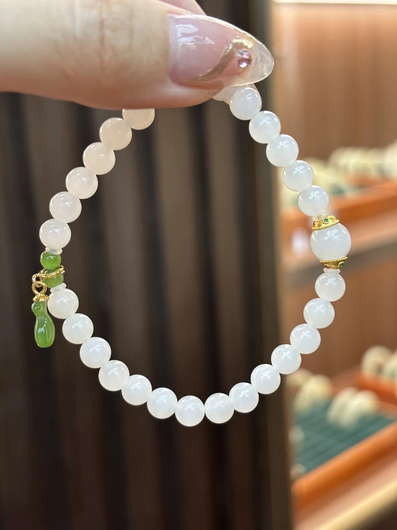 0630和田玉羊脂白约6mm圆珠手串多样性发其一