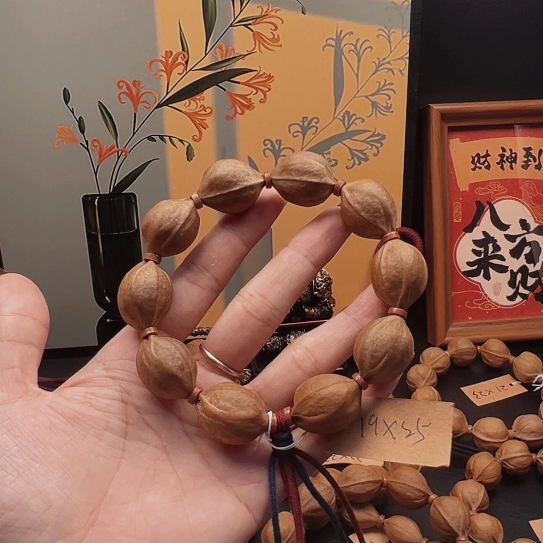 楊***杨手串橄榄核19.25梅林铁核