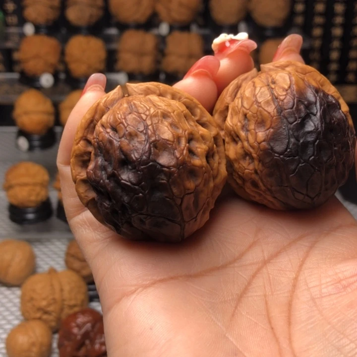 橄榄核把件58至尊 元宝