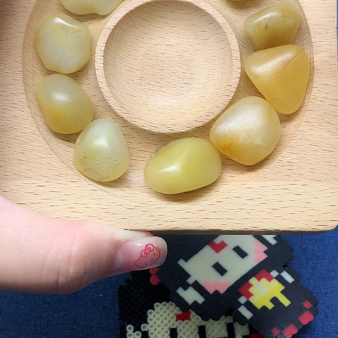 甜***.和田玉未镶嵌颈饰