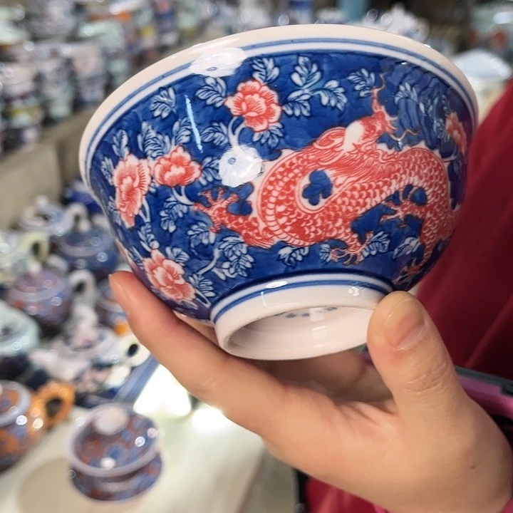 瓷片////直径12.5厘米。红西西。