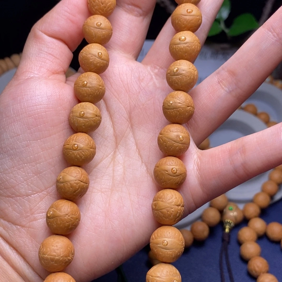 凤眼菩提吊坠12.5手持