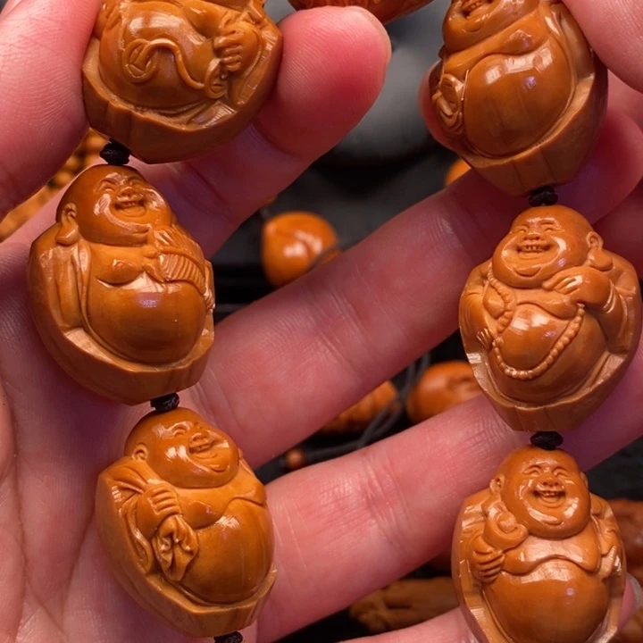 手串橄榄核包衣弥勒