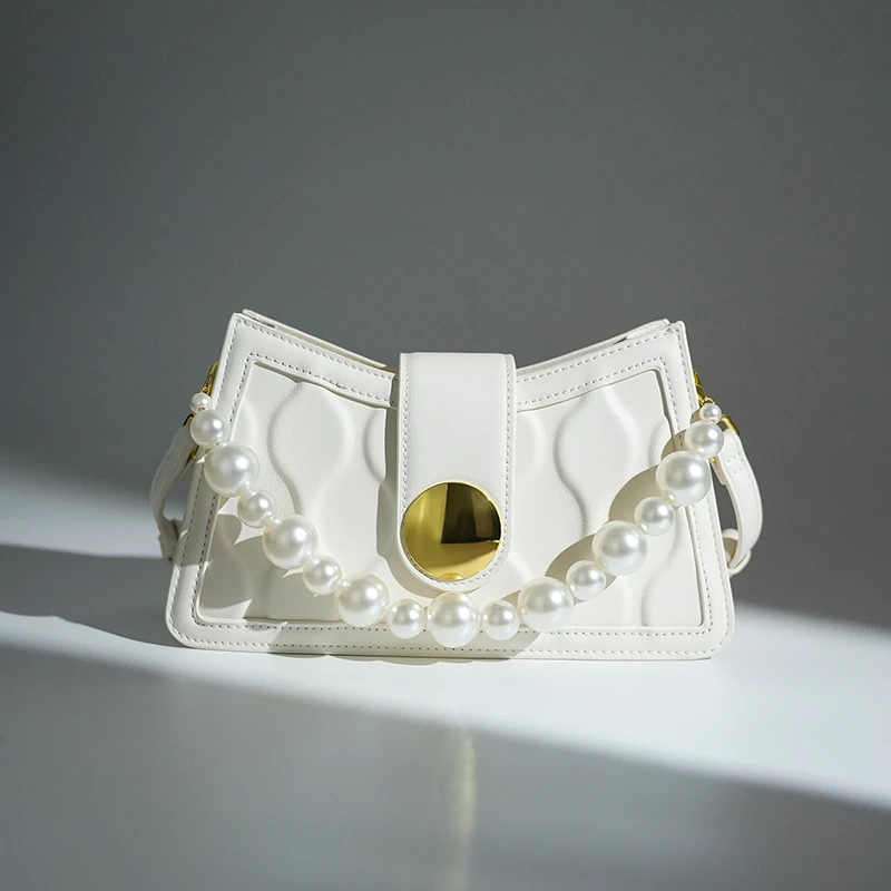 雅各邦真皮白色串珠腋下包女2025新款潮高级感轻奢小众通勤月牙包