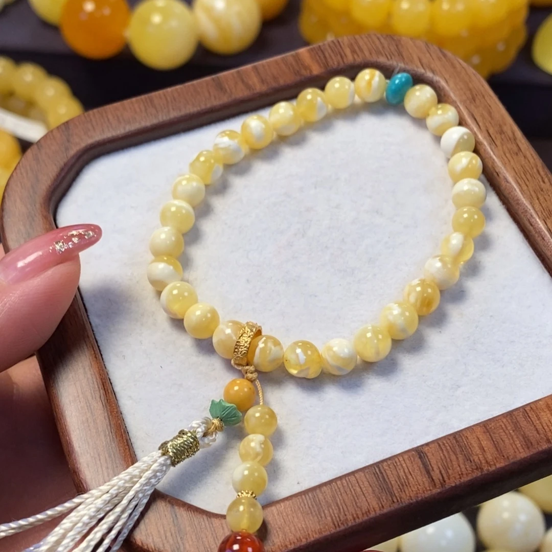 琥珀未镶嵌裸石白花蜡手串