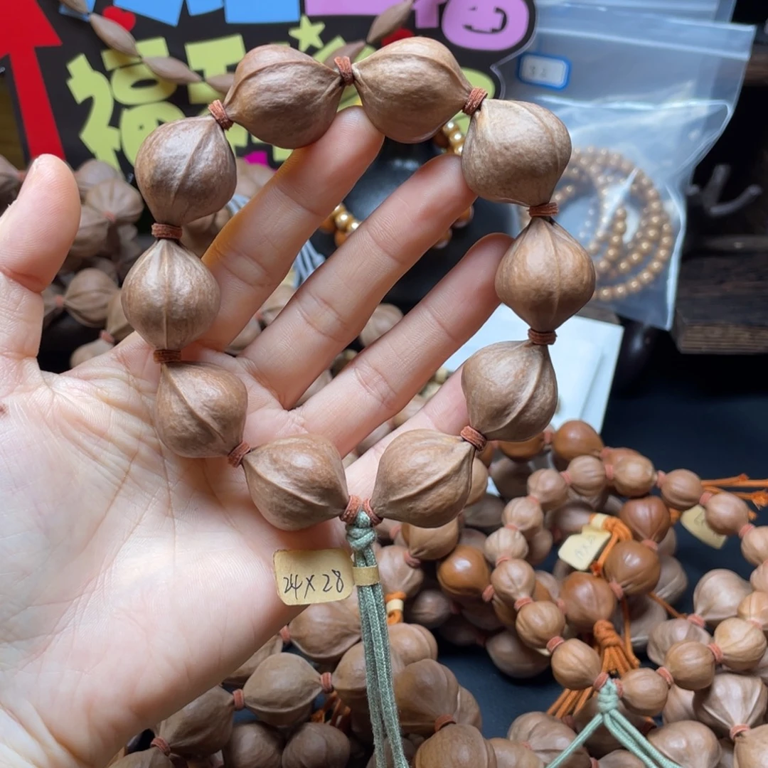 钟***橄榄核吊坠2428铁核