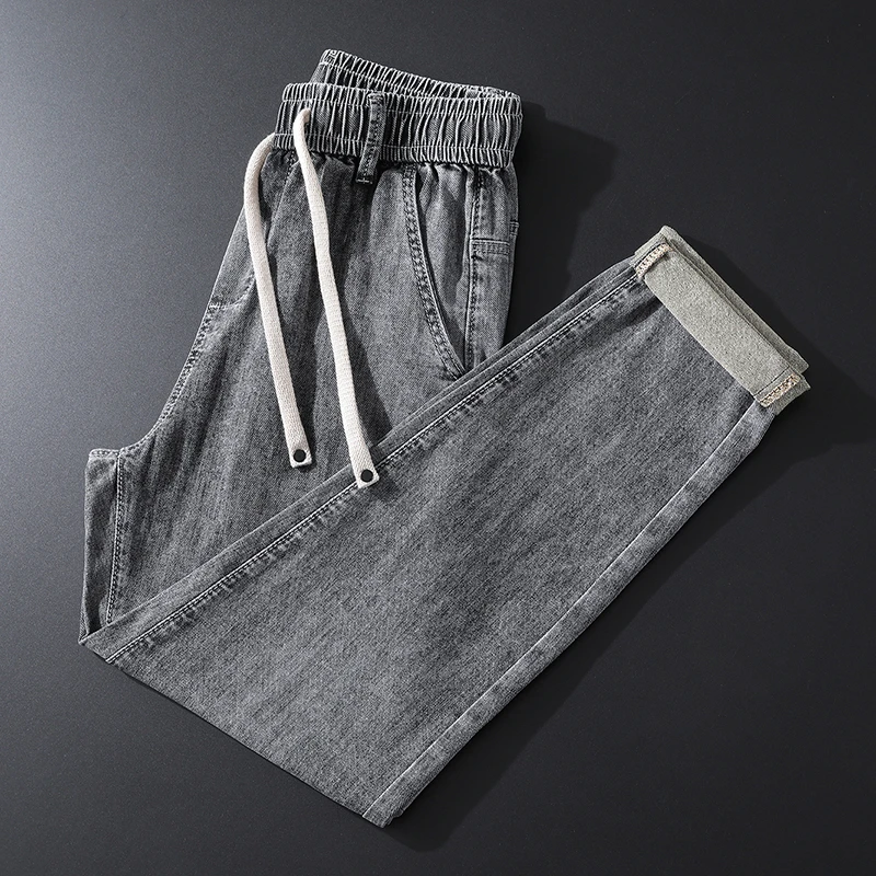 库约内姆KOYENEMAL新款松紧腰抽绳牛仔裤男修身小脚裤夏季薄款