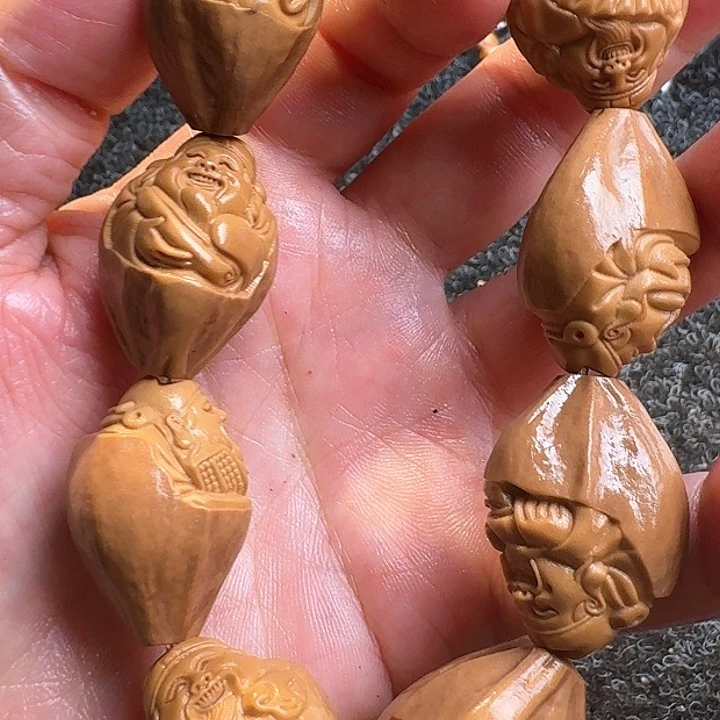 橄榄核吊坠橄榄包衣财神