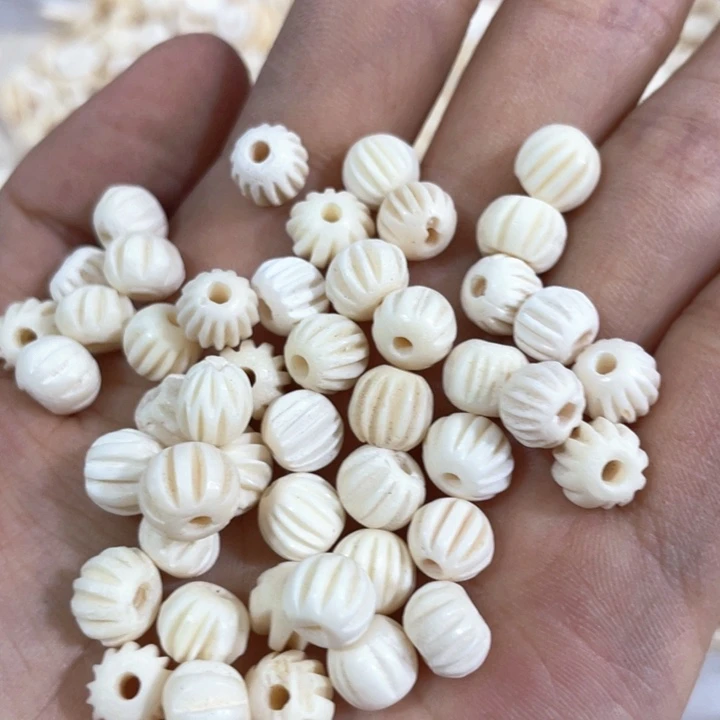 贝壳非金属15颗雕刻珠随机