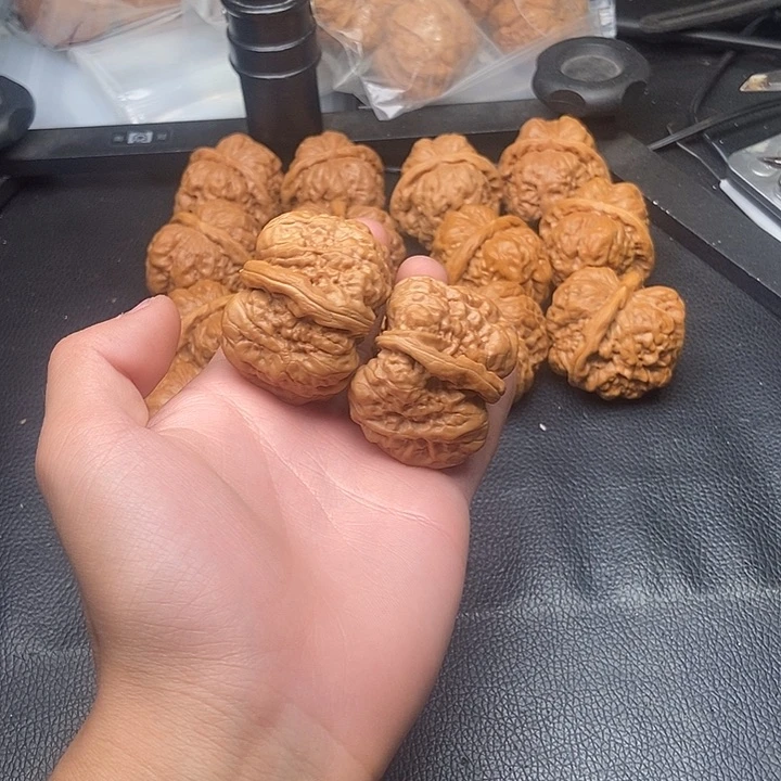 桃核吊坠张*丝628862893