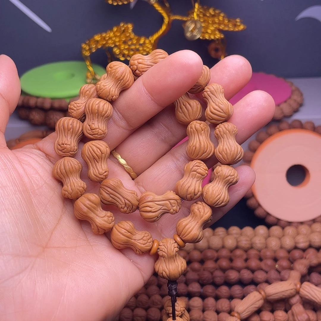 沙****吊坠桃核龙纹桃核花生手持