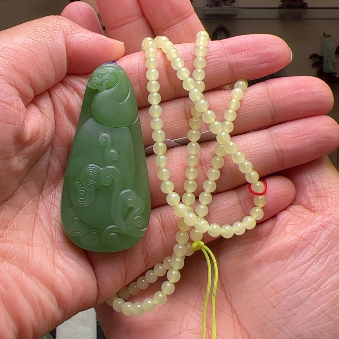 和田玉未镶嵌挂件夹****司