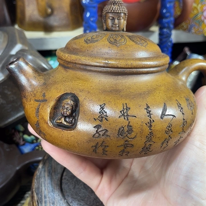 茶壶紫泥原矿泥料手工制作的一把紫砂壶。