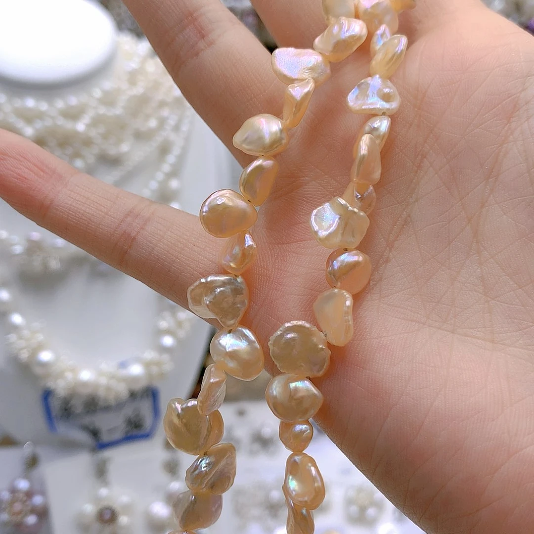 银S925镶嵌耳饰淡水珍珠健**安