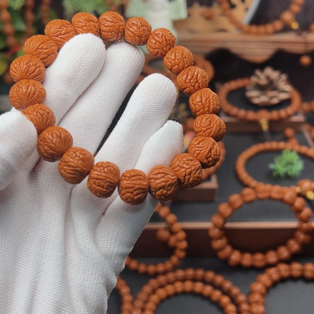 吊坠桃核鸿**头1.4红皮荔枝手串