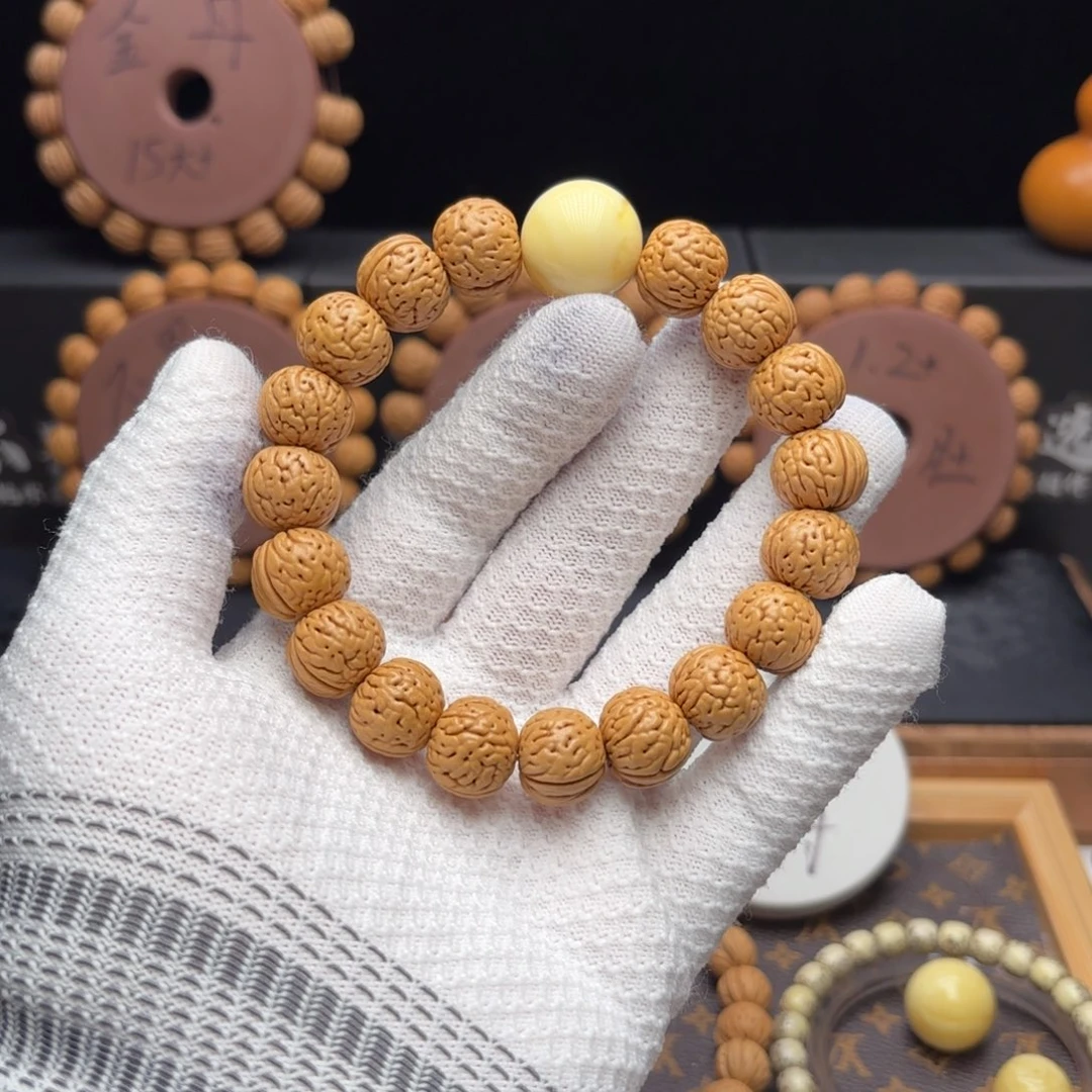 加***加桃核吊坠奶油金丹