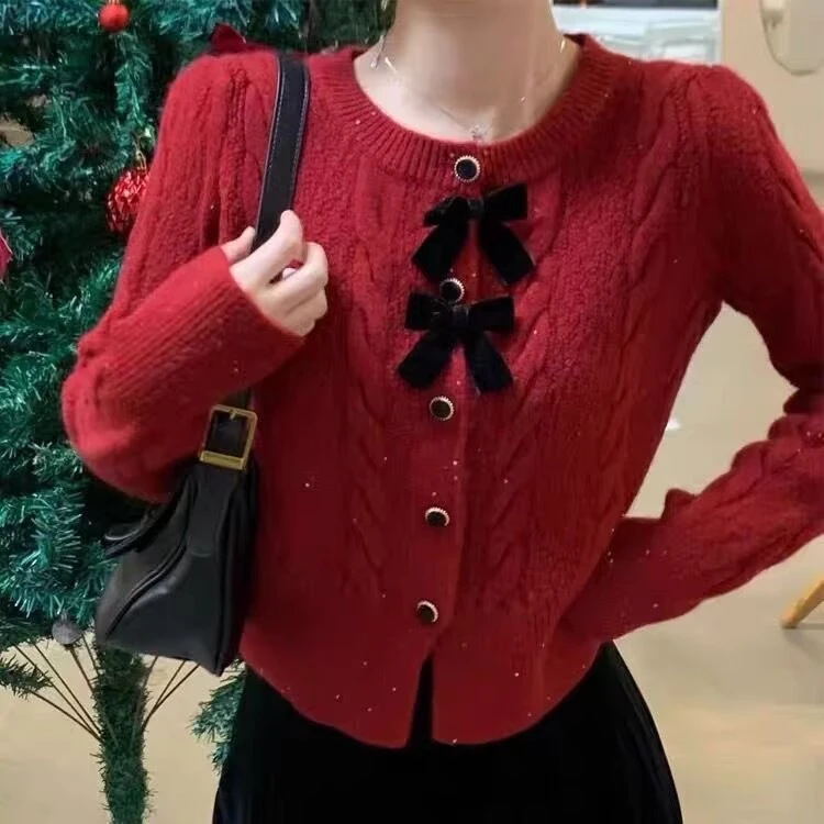 春秋新款温柔蝴蝶结时尚毛衣外套女泡泡袖麻花小香风长袖针织开衫