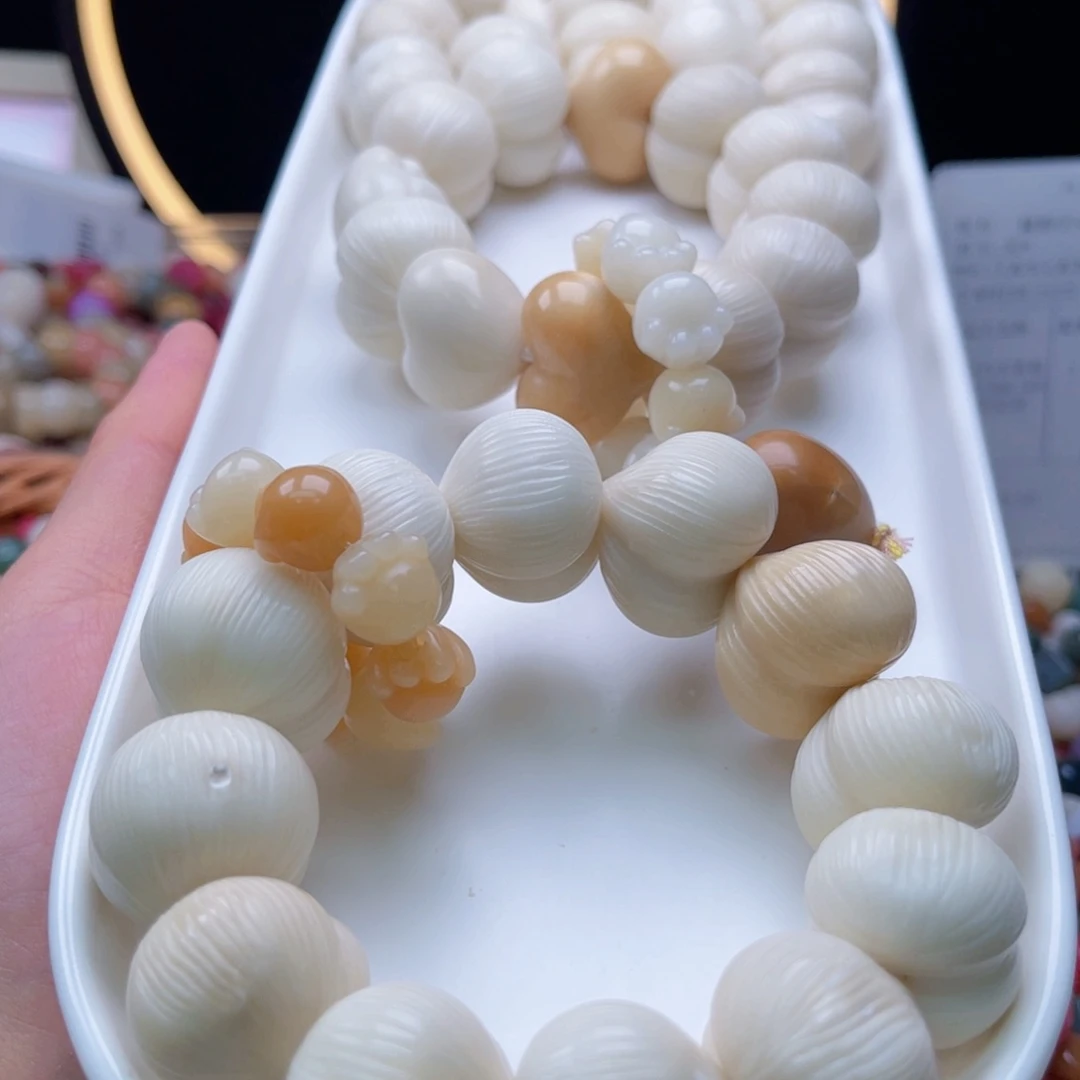 吊坠白玉菩提b23+mm/5颗象牙果拉丝屁桃瑕