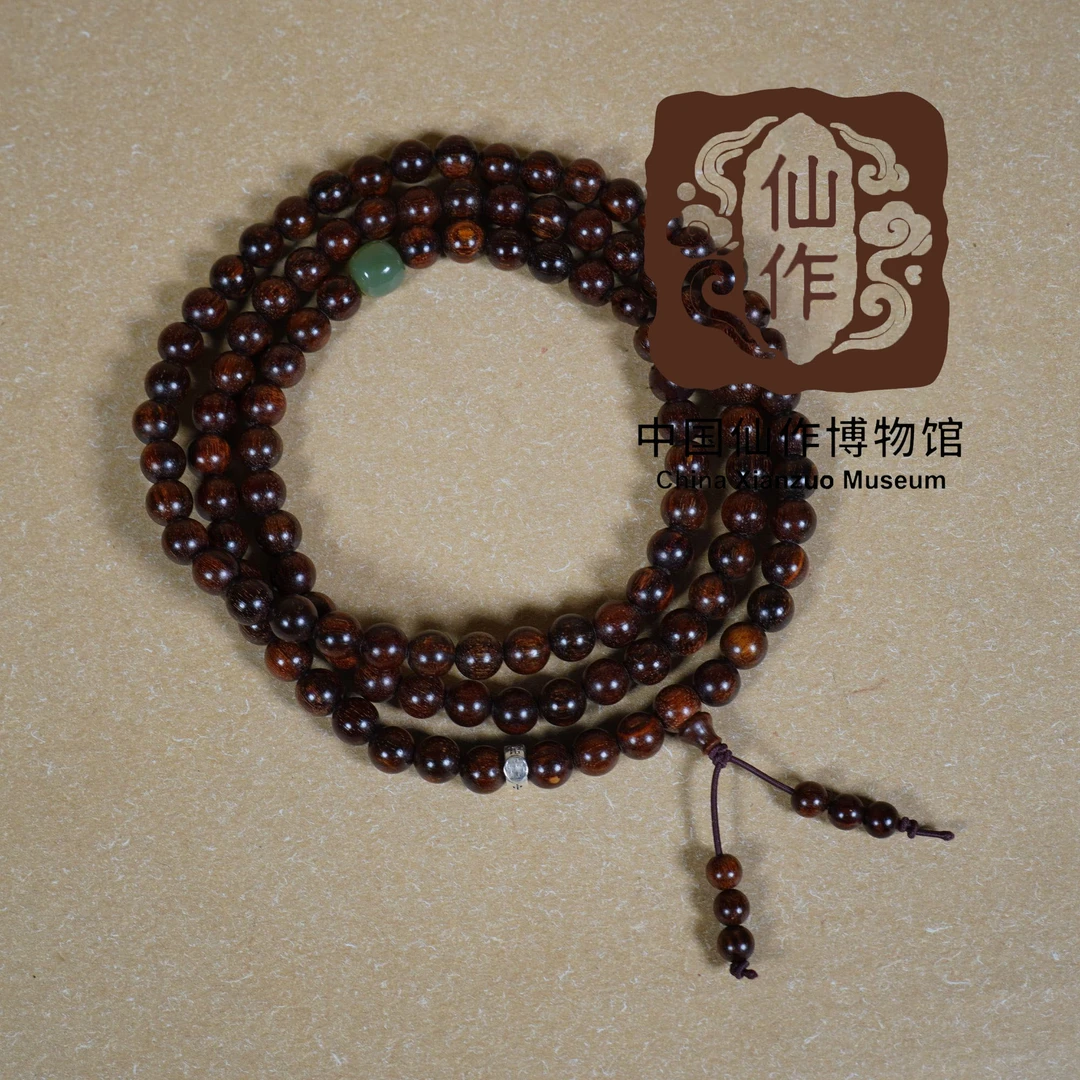 【中国仙作博物馆】巴布亚贡木0.8*108暗夜星空+玉+银多圈手串木雕