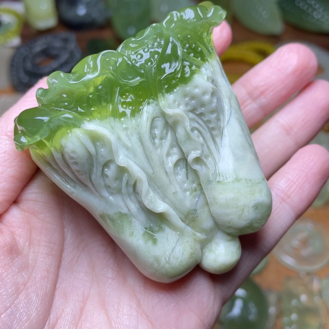 朱***语蛇纹石玉未镶嵌手把件