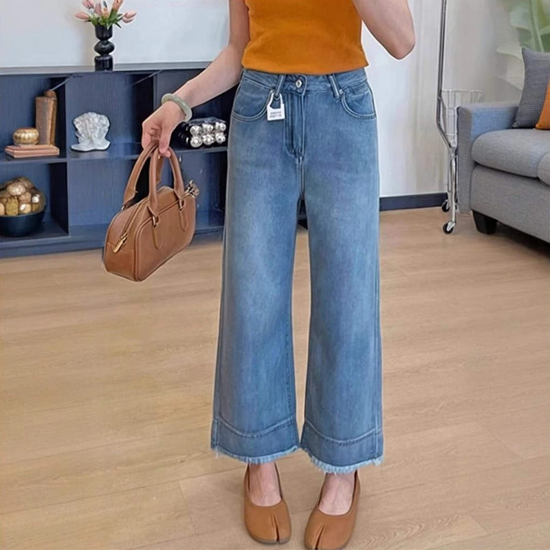 大码遮肉微喇牛仔裤女早秋款梨形身材高腰宽松显瘦毛边九分喇叭裤