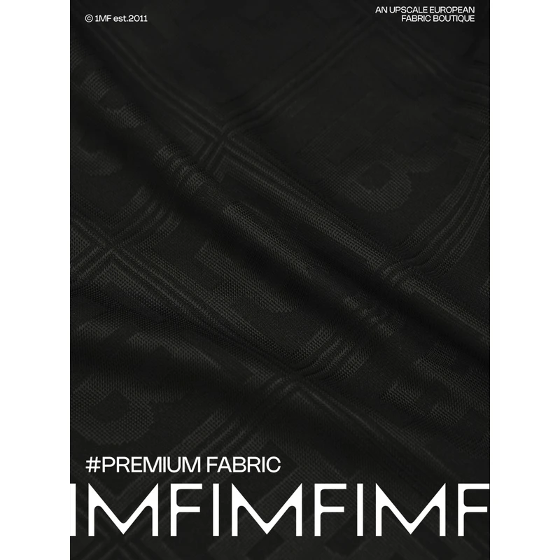 1212每米省72元7折BRB VI黑色字母格纹提花针织面料 幅宽180CM