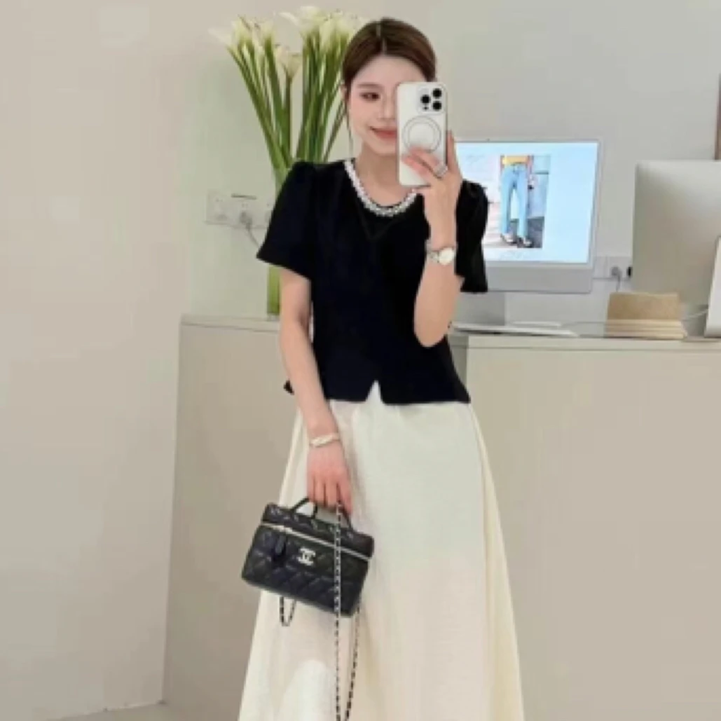 温柔风气质黑色珍珠泡泡袖开叉上衣女2025夏季设计感法式短袖套裙