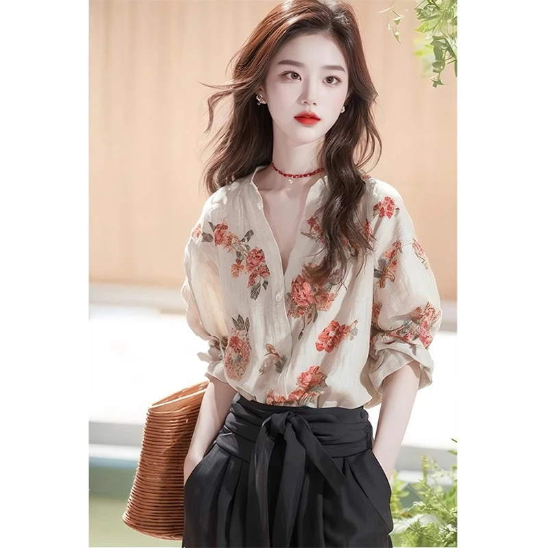法式独特小上衣今年流行漂亮小衫早春新款亚麻棉麻印花长袖衬衫女