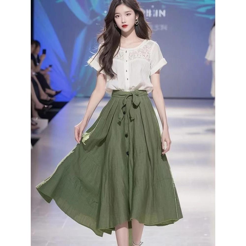 时尚休闲薄荷曼波风绿A字伞裙女2025夏季新款褶皱设计感半身裙子