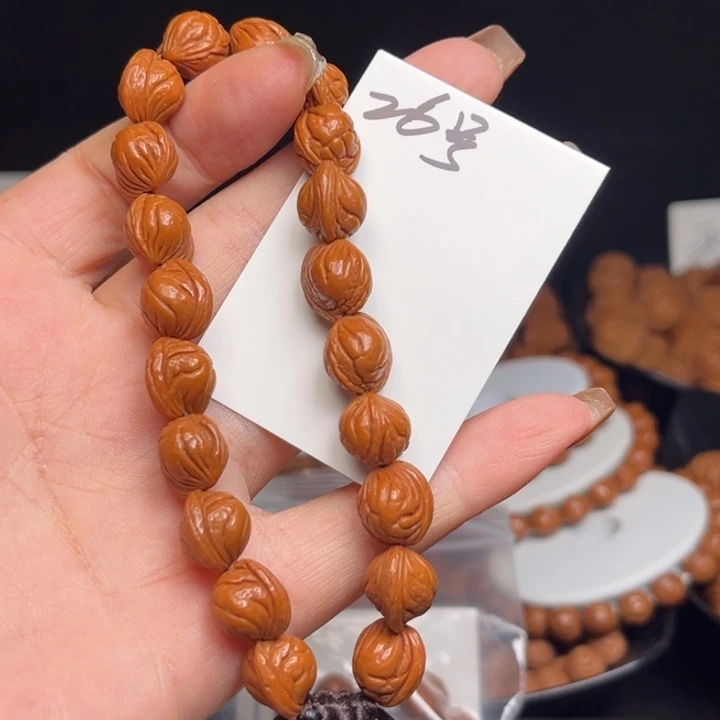 任***哥桃核吊坠小龙纹10左右22颗手串