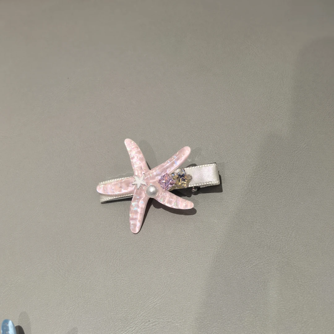 F499粉色冰透小海星闪闪边夹