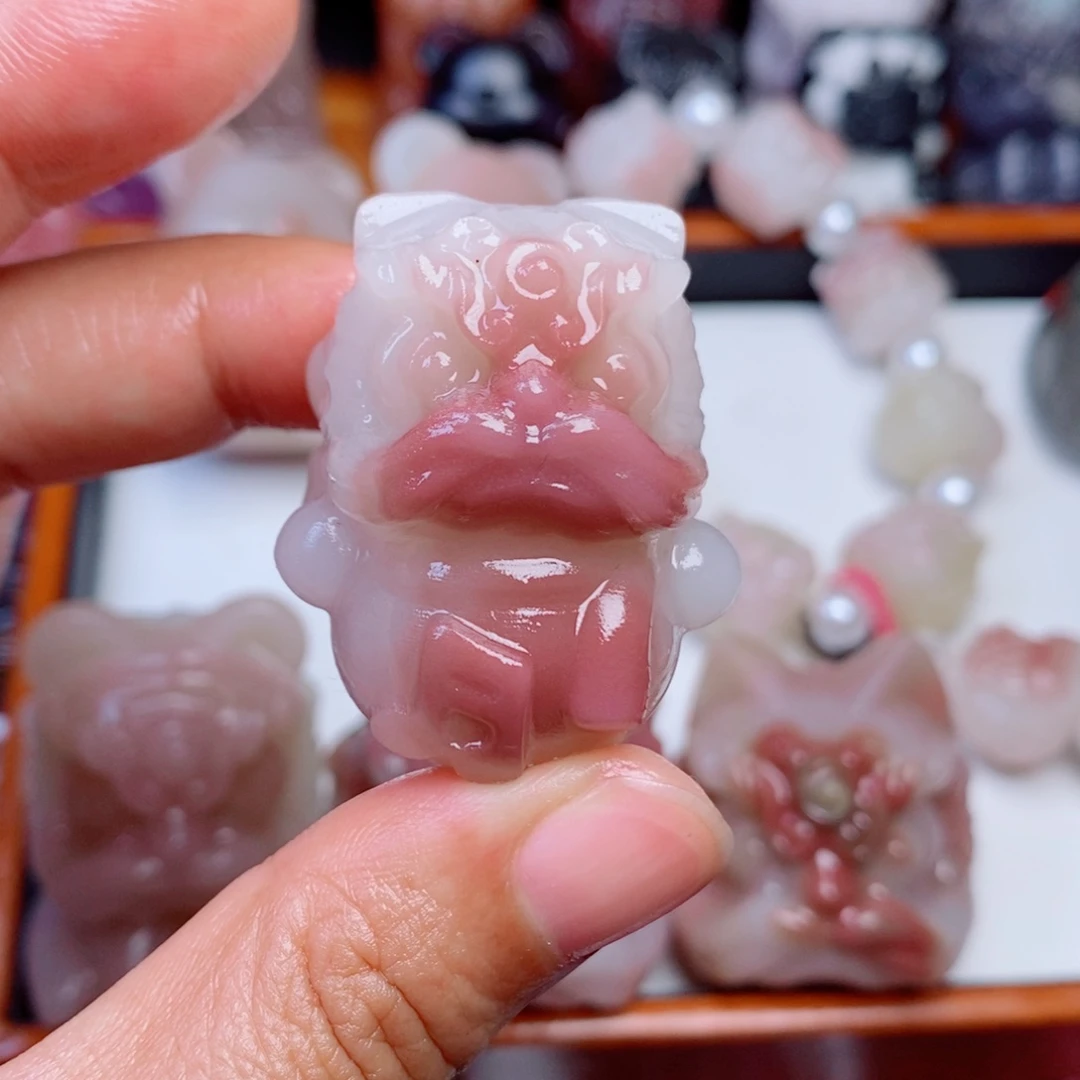 玛瑙音乐狮手把件