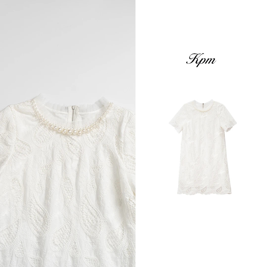 2025夏季新品设计感简约优雅气质镂空树叶圆领钉珠连衣裙女JN7907