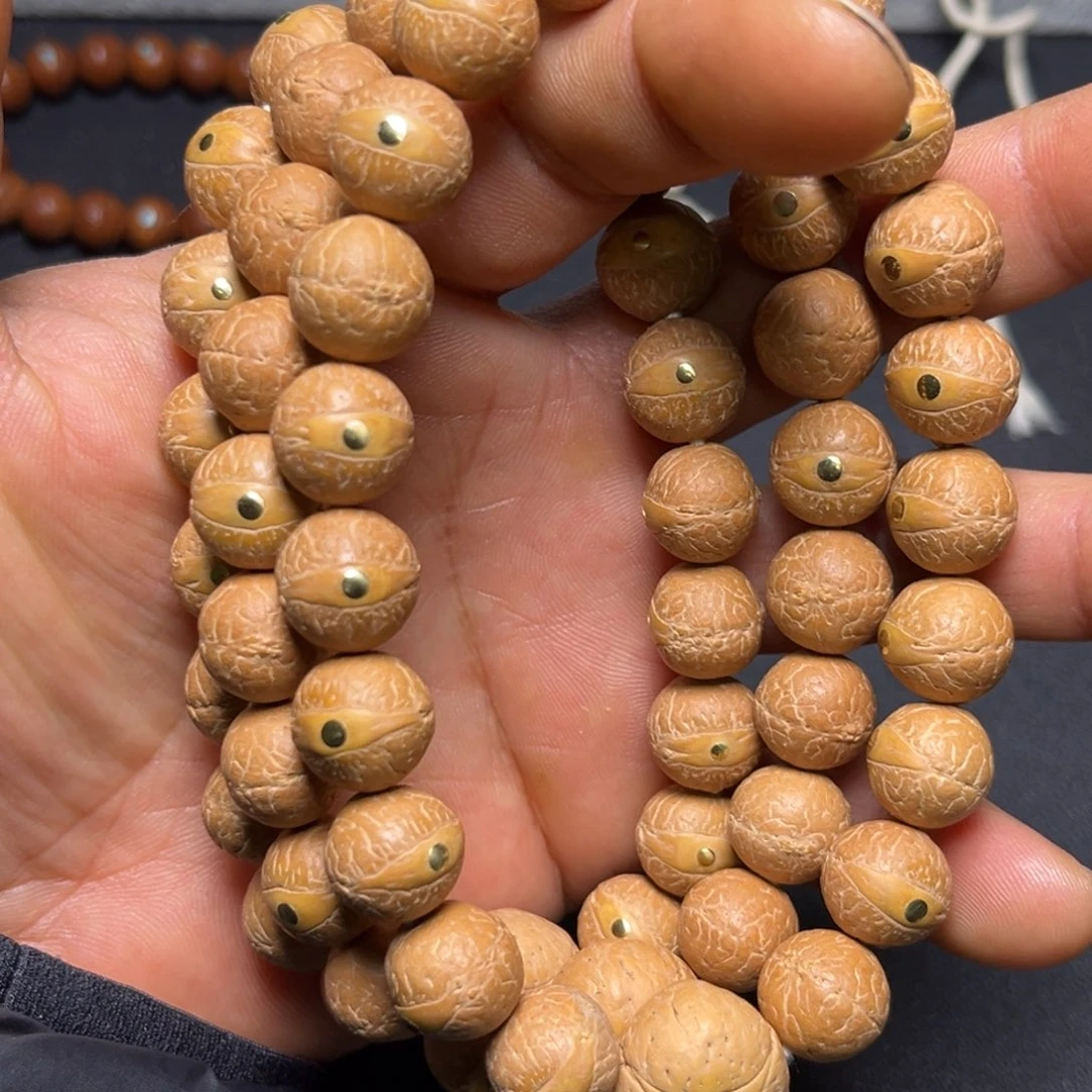 凤眼菩提吊坠12.5铜钉镶嵌手串