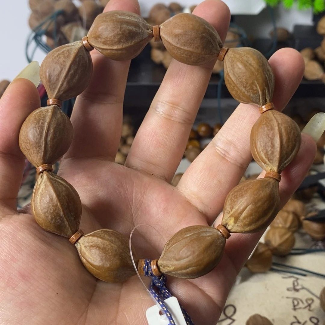 往***生橄榄核手串1927梅林铁核