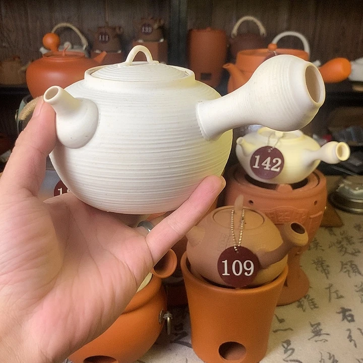 梅姐，玛瑙砂铫壶。