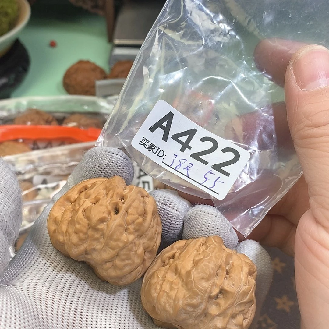 桃核把件蛤蟆头38尺。