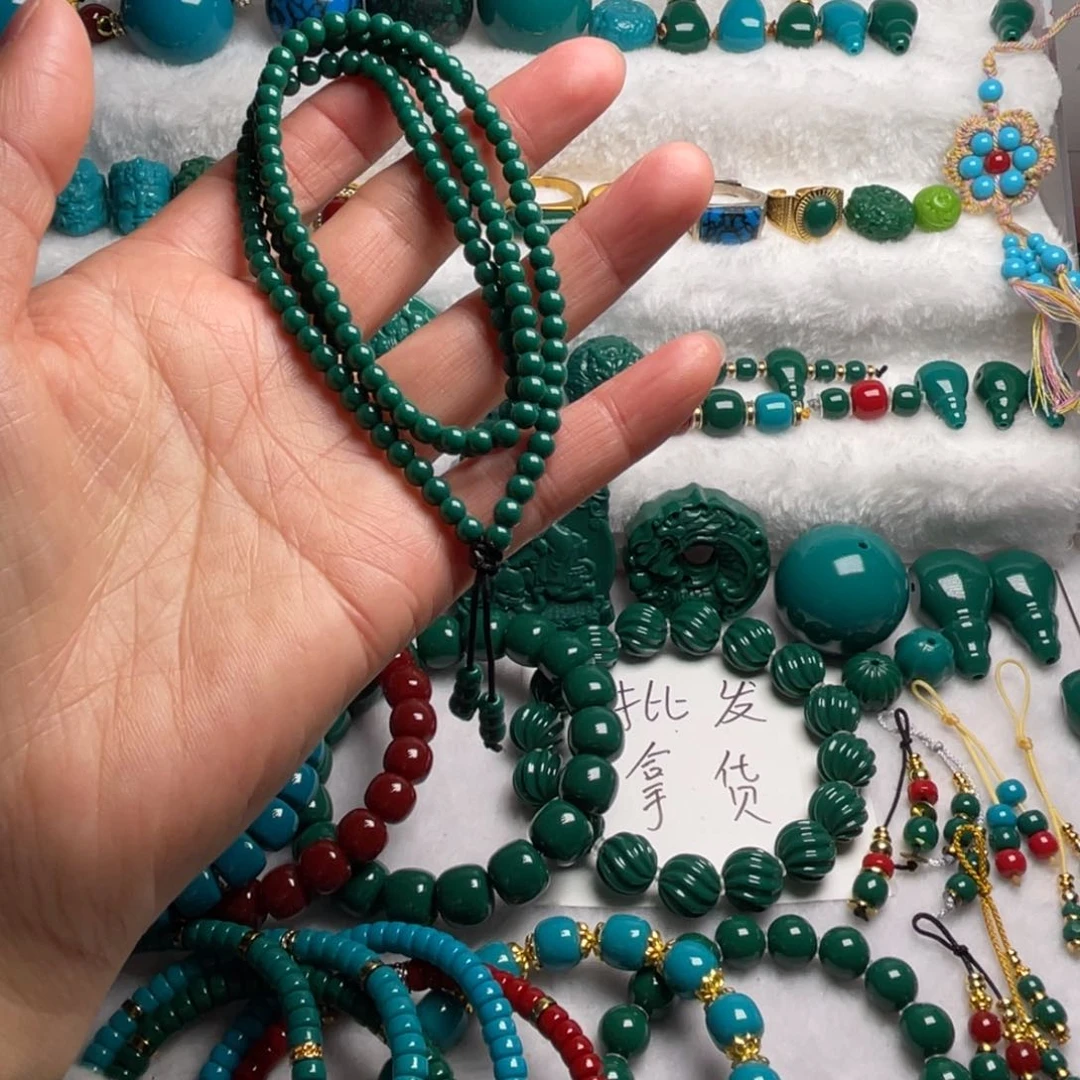 石材任**有卡4绿圆珠链