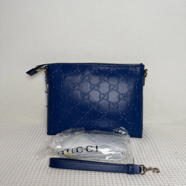 未使用 GUCCI/古驰 5817/男士时尚深蓝色全皮压纹单肩包/可手拿