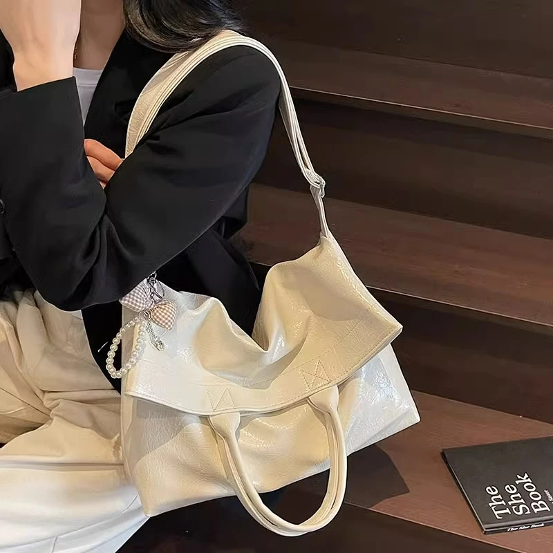 大容量手提包包女2025新款春夏通勤时尚托特包简约休闲单肩斜挎包