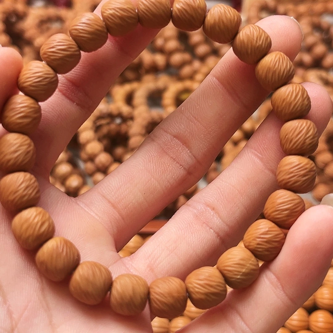 桃核手串返油无暇千刃拉丝云锦（无黑点无油点）