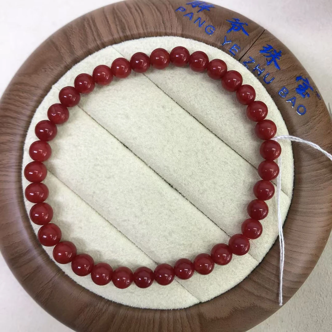 天然珊瑚科西卡深牛血圆珠手链