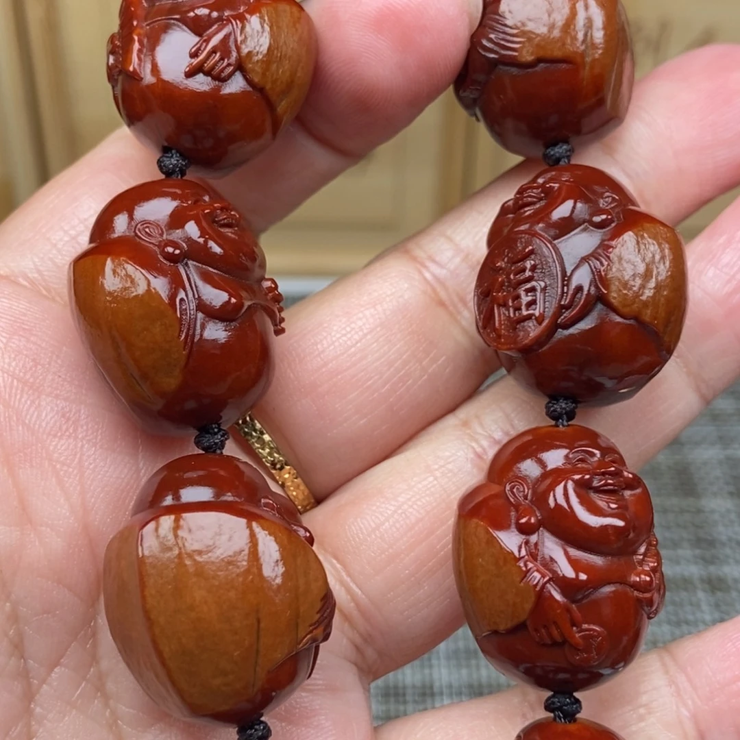 昵***置橄榄核吊坠米勒22